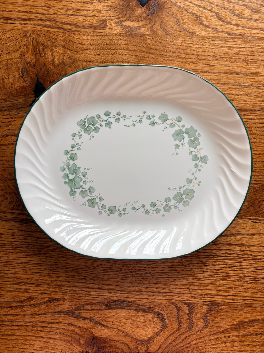 Corelle Callaway Serving Platter with Green rim and Ivy on surface- swirled edge